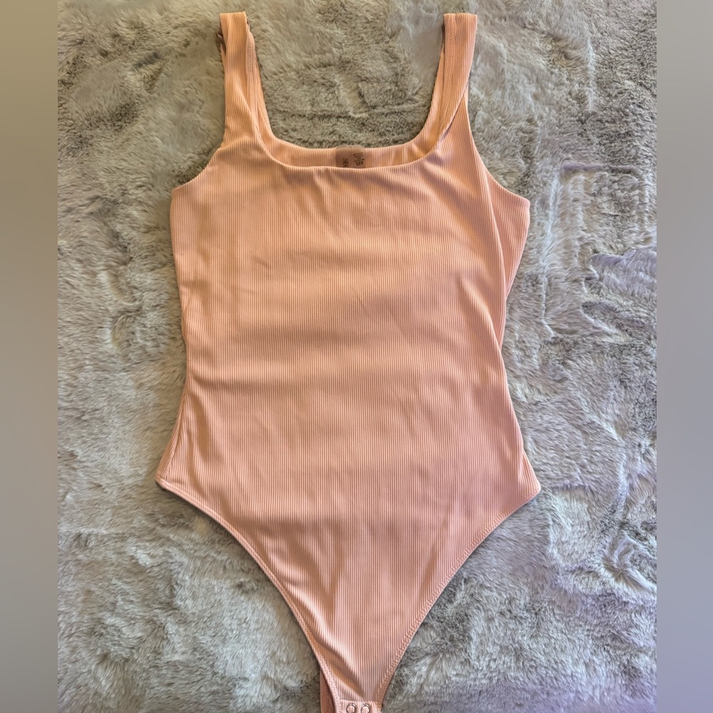 pale pink double lined body suit